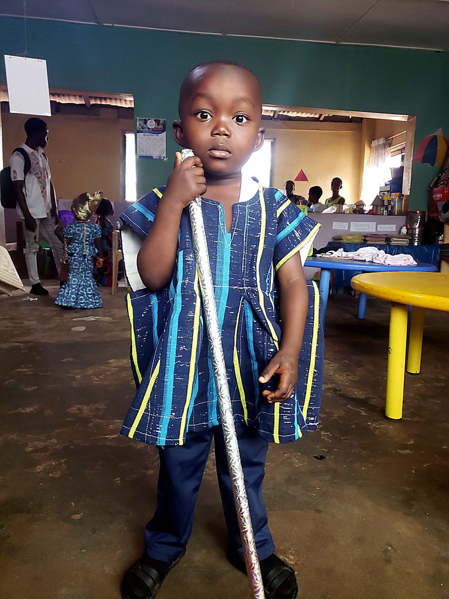 A pupil in traditional kente on Cultural Day