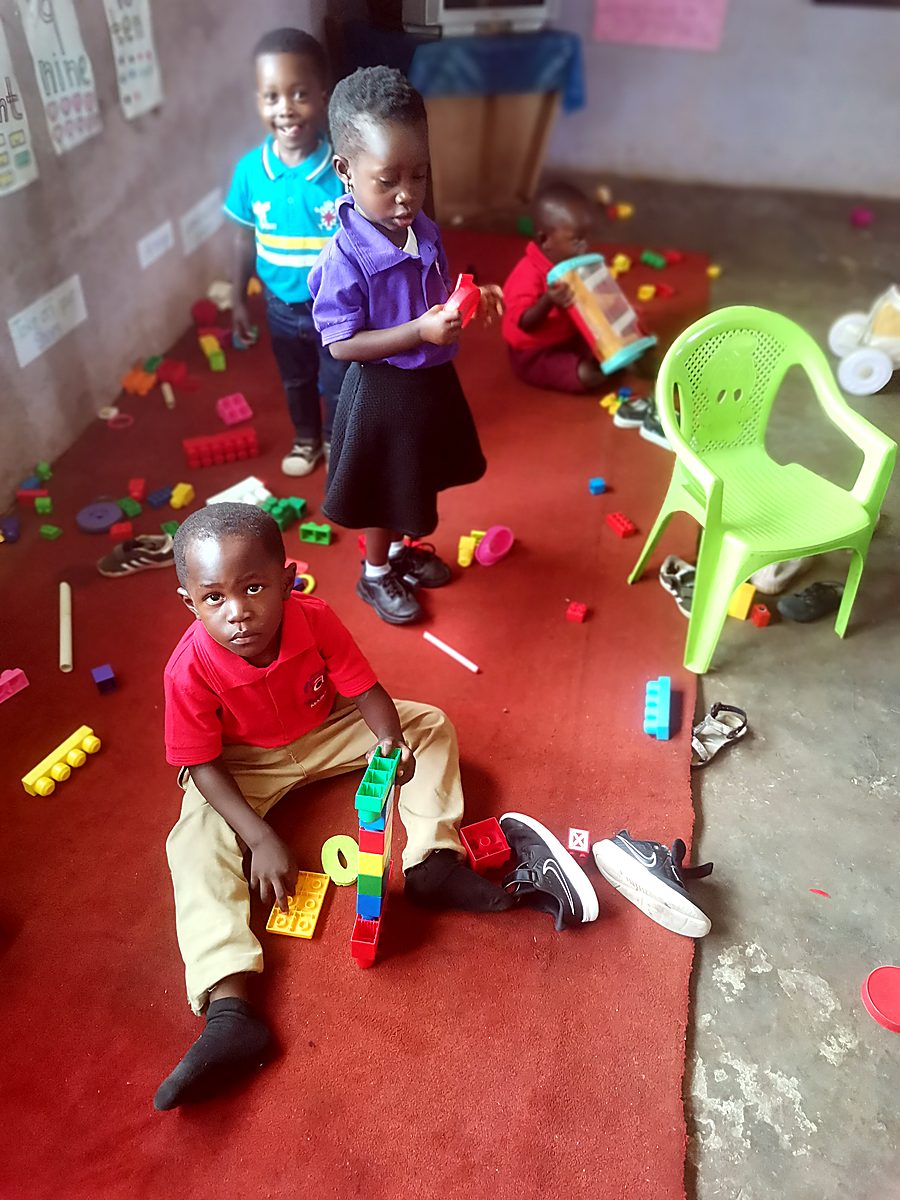Pupils playing with building blocks